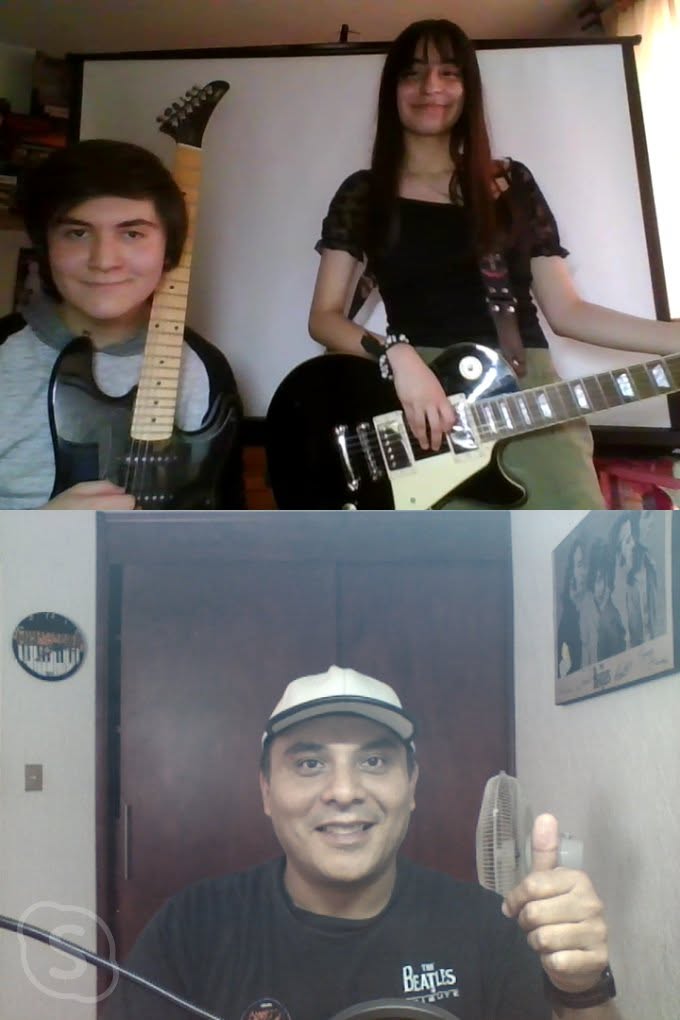 Alumnos de guitarra eléctrica en sesión grupal en Academia 909